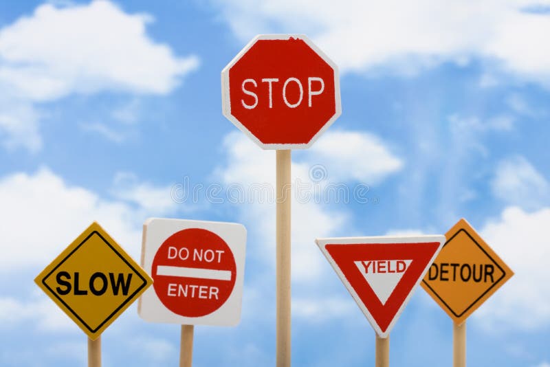 Road signs sitting on a sky background, knowing when to quit. Road signs sitting on a sky background, knowing when to quit