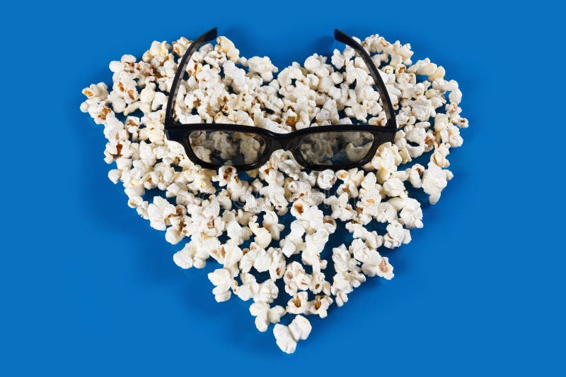 Vetri e cuore stereo del popcorn fotografia stock Vetri e cuore stereo del popcorn fotografia stock