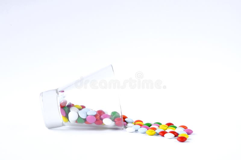 Vetro con i dolci su un fondo bianco immagine stock libera da diritti Vetro con i dolci su un fondo bianco immagine stock libera da diritti