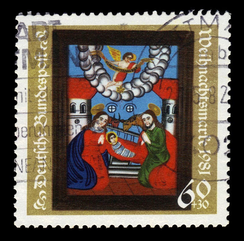GERMANY, Berlin - CIRCA 1981: a postage stamp printed in the Germany, shows stained glass with the birth of Christ, nativity scene, series: christmas, circa 1981. GERMANY, Berlin - CIRCA 1981: a postage stamp printed in the Germany, shows stained glass with the birth of Christ, nativity scene, series: christmas, circa 1981