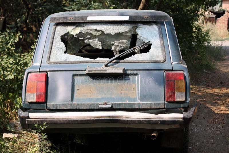 Smashed out car glass, many jagged little pieces. Smashed out car glass, many jagged little pieces