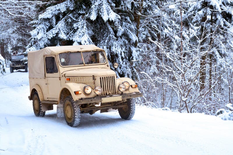 Winter offroad journey in forest on vintage jeep. Winter offroad journey in forest on vintage jeep