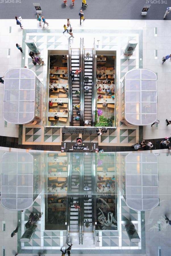 Looking down at the main floor entrance hall and the lower level food court inside the Time Warner Center in New York City. Looking down at the main floor entrance hall and the lower level food court inside the Time Warner Center in New York City.