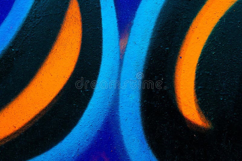 Vibrant Abstract Graffiti in Blue und Orange für Urban 80s Street Art lizenzfreie stockfotografie