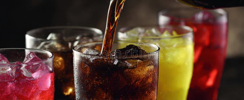 The vibrant array of refreshing drinks in colorful glasses with ice.. image stock photography.