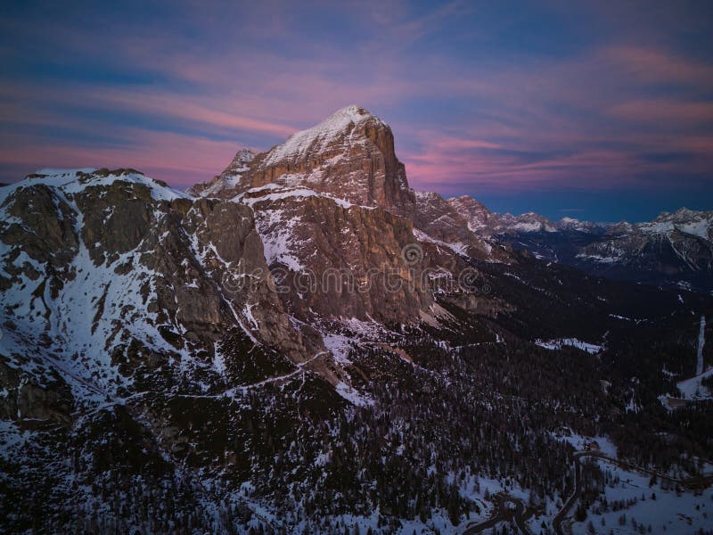 Vibrant colorful sunset in Dolomites, Italy. Monte Lagazuoi in winter royalty free stock photos
