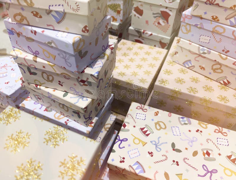 A vibrant display of decorative gift boxes stacked in an appealing arrangement royalty free stock photography