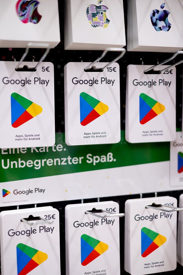 Colorful Google Play Gift Cards Display - FRANKFURT, GERMANY - MARCH 21, 2025. A vibrant display of Google Play gift cards showcasing different values, ideal for app and game purchases on Android devices. - FRANKFURT, GERMANY - MARCH 21, 2025