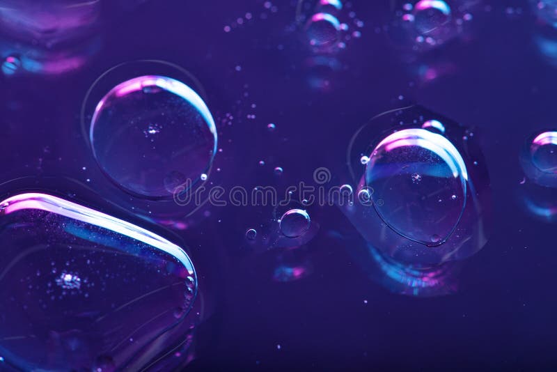 Vibrant neon purple liquid background royalty free stock photos