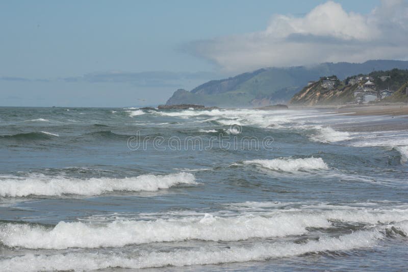 Vibrant spring vista on picturesque Siletz Bay and headlands, on the central coast of Oregon. Vibrant spring vista on picturesque Siletz Bay and headlands, on the central coast of Oregon.