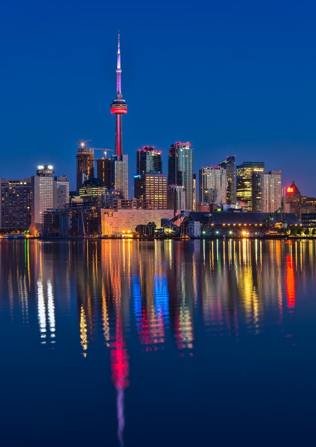 Vibrant Toronto Skyline With Reflection