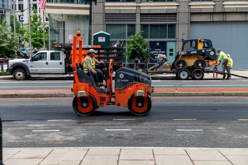 Vibrating road roller for asphalt construction in downtown Washington DC dc stock photography