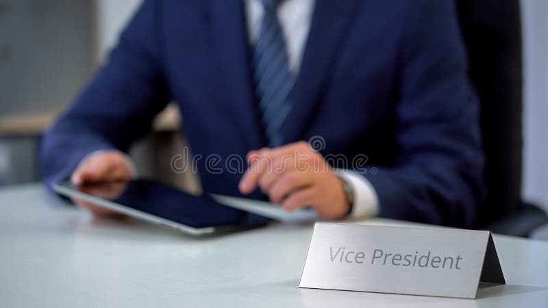 Vice president viewing files on tablet pc, replacing head of state in office royalty free stock images Vice president viewing files on tablet pc, replacing head of state in office royalty free stock images