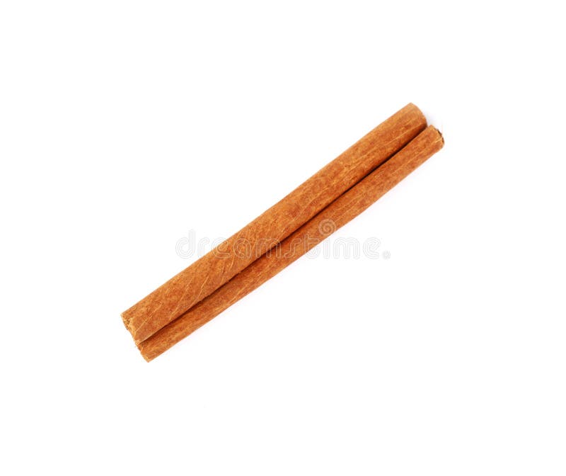 Vicino su un bastone di cannella isolato su bianco immagini stock libere da diritti Vicino su un bastone di cannella isolato su bianco immagini stock libere da diritti
