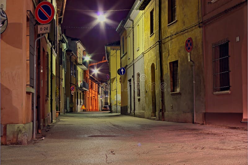 Grunge dark alley, slums of the city, dirty corner of street, the decadent old town, street at night in the slum, distressed italian alleyway. Grunge dark alley, slums of the city, dirty corner of street, the decadent old town, street at night in the slum, distressed italian alleyway