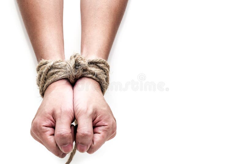 Victim, slave, prosoner male hands tied by big rope