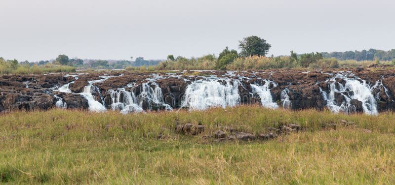 Victoria Falls-panorama met zambezi rivier royalty-vrije stock foto Victoria Falls-panorama met zambezi rivier royalty-vrije stock foto