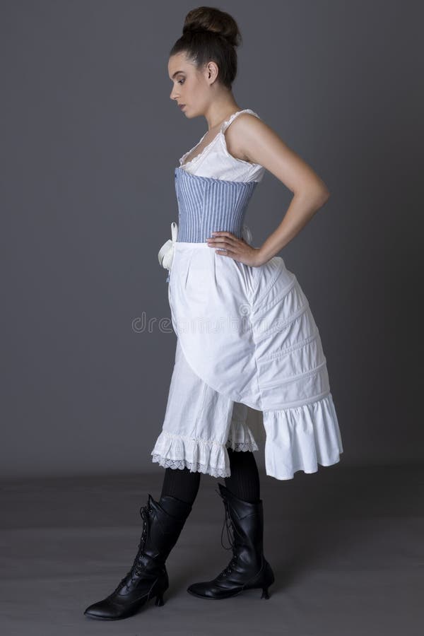 Woman In Victorian Underwear Bloomers And Lace Corset Looking In An Antique  Mirror Stock Photo, Picture and Royalty Free Image. Image 148752987.