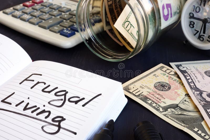 Vida frugal escrita en un cuaderno de notas foto de archivo libre de regalías Vida frugal escrita en un cuaderno de notas foto de archivo libre de regalías