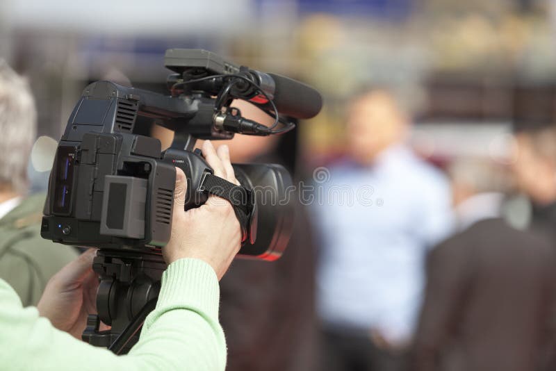 Man Taping with Video Camera Stock Image Image of focus, production