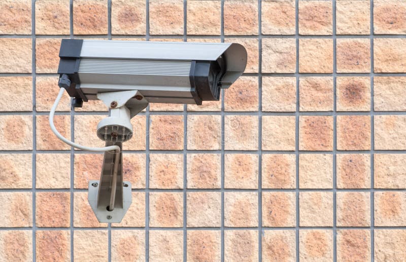 Video Camera Security System on the Wall Stock Photo Image of white