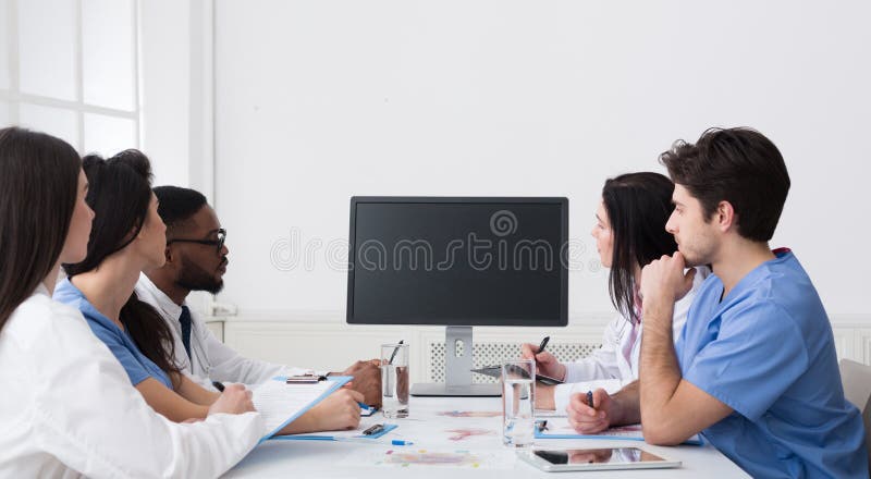 Video Conference. Team Of Doctors Having Meeting In Hospital royalty free stock images Video Conference. Team Of Doctors Having Meeting In Hospital royalty free stock images