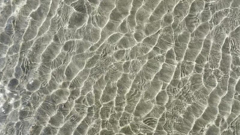 Video documentation of ripples in shallow water stock video