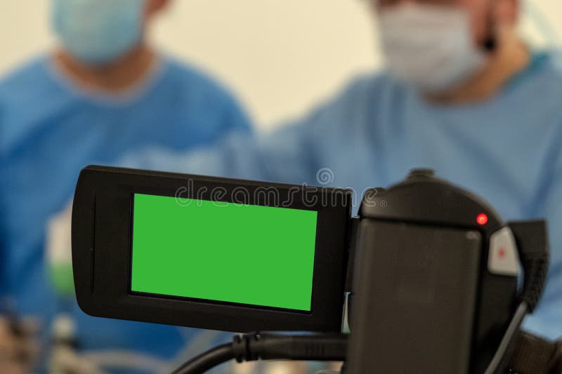 Compassion Welcome jury Video Recording and Live Broadcast of the Work of Two Surgeons. Operating  Room Surgical Hospital. Green Screen Camcorder. Copy Stock Photo - Image of  clinic, doctor: 138369724