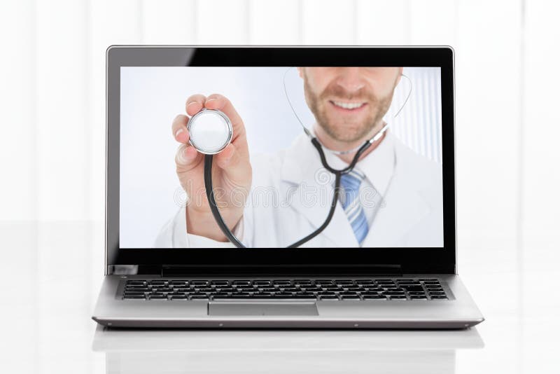 Videoconferencing With Doctor On Laptop stock photo Videoconferencing With Doctor On Laptop stock photo