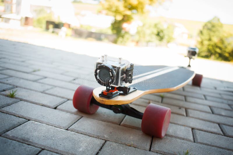 Longboard equipped with two extreme cameras. Longboard equipped with two extreme cameras.