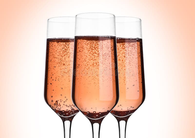 Vidrio de champán de la rosa del rosa con las burbujas en rosa imagenes de archivo Vidrio de champán de la rosa del rosa con las burbujas en rosa imagenes de archivo