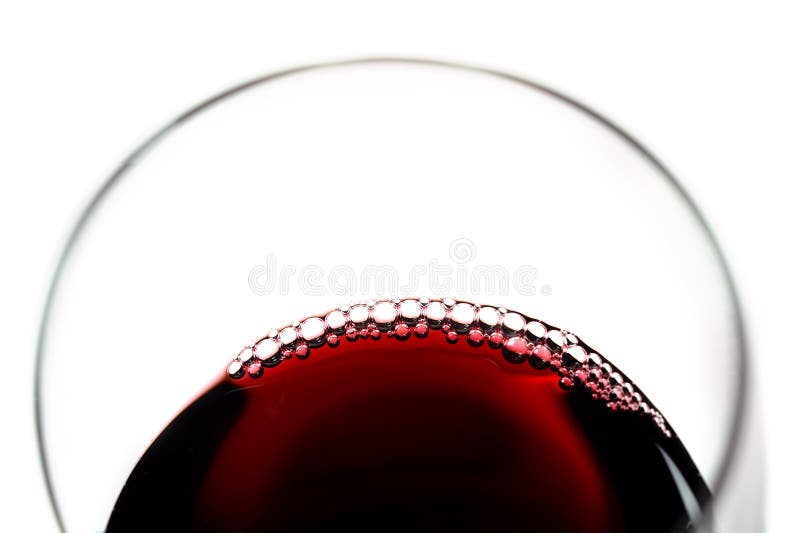 Vidrio de vino rojo con las burbujas foto de archivo Vidrio de vino rojo con las burbujas foto de archivo