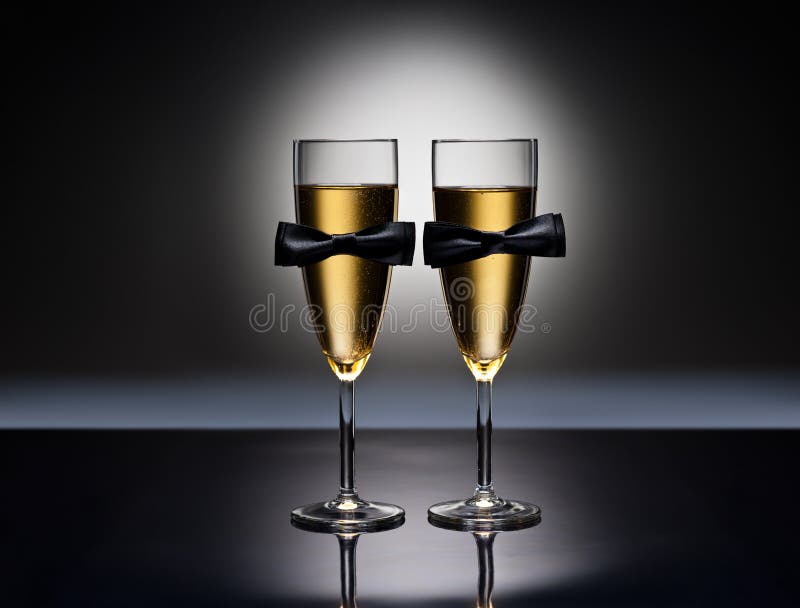 Champagne glasses with conceptual same sex decoration for gay men. Champagne glasses with conceptual same sex decoration for gay men