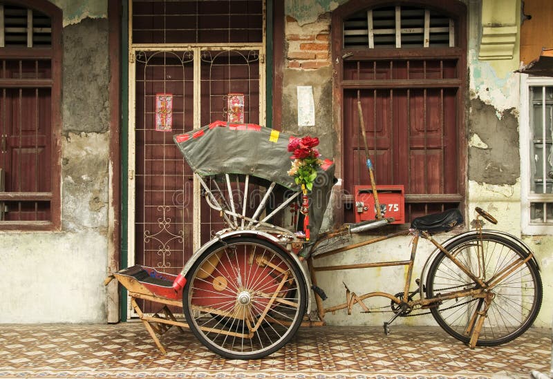 Vieille maison rouge de pousse-pousse et d'héritage, Penang, Malaisie