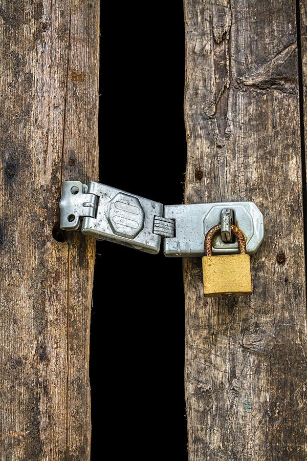 Vieille serrure principale sur la porte en bois photo stock Vieille serrure principale sur la porte en bois photo stock