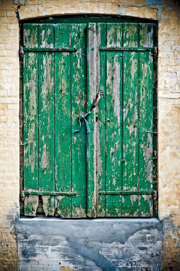 Old green door made of wood. Old green door made of wood