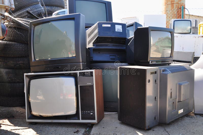 Pile of old TV s, waste, outdated electronic collected. Pile of old TV s, waste, outdated electronic collected.