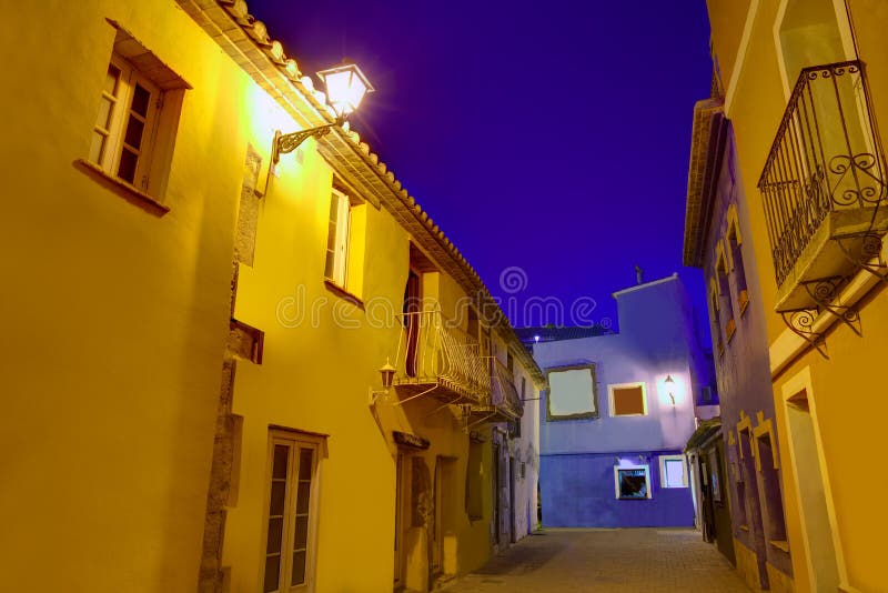 Vieja oscuridad de la puesta del sol del pueblo de Denia en Alicante España fotografía de archivo libre de regalías Vieja oscuridad de la puesta del sol del pueblo de Denia en Alicante España fotografía de archivo libre de regalías