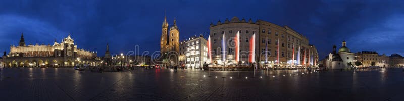 Vieja plaza del mercado de la tubería de la ciudad de Kraków fotos de archivo libres de regalías Vieja plaza del mercado de la tubería de la ciudad de Kraków fotos de archivo libres de regalías