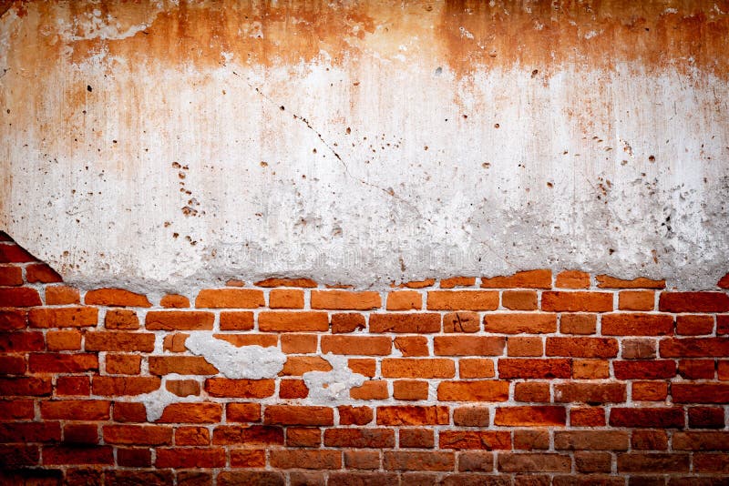 Vieja textura de la pared de ladrillo con yeso dañado, el fondo rojo de Stonewall del Grunge, el fondo del grunge y el espacio de fotos de archivo Vieja textura de la pared de ladrillo con yeso dañado, el fondo rojo de Stonewall del Grunge, el fondo del grunge y el espacio de fotos de archivo