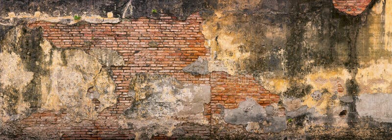 Viejo, desmenuzando, pared de ladrillo en Georgetown, Penang, Malasia