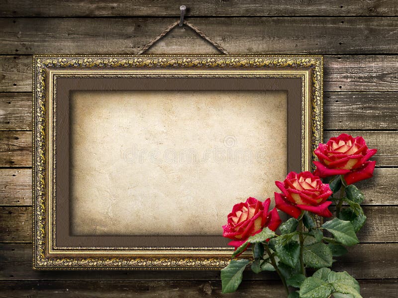 Image Old vintage frame for photos and a bouquet of red roses. Image Old vintage frame for photos and a bouquet of red roses