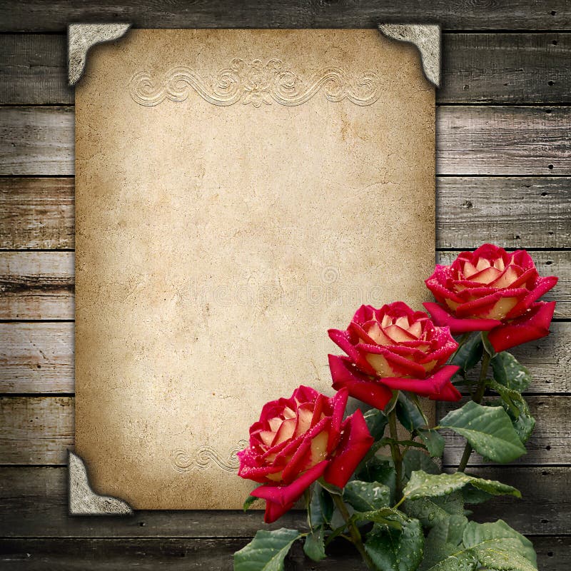 Image Old vintage frame for photos and a bouquet of red roses. Image Old vintage frame for photos and a bouquet of red roses