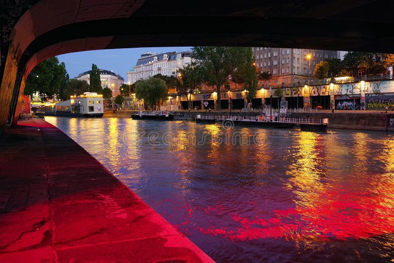 VIENA, AUSTRIA, 15 SEPTEMBER, 2019: Evening lights in Viena. Promenade on Donaukanal.