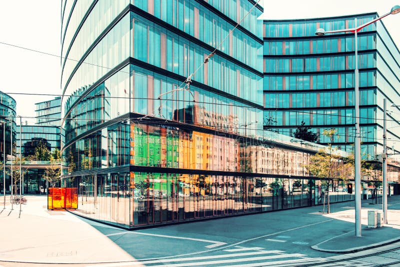 Vienna, Austria. Modern steel glass building with empty street.