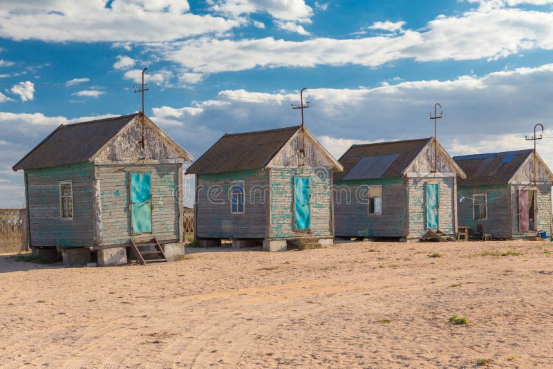Vier alte Strandhütten stockbilder Vier alte Strandhütten stockbilder