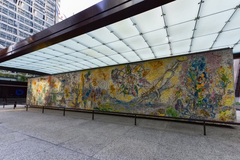 Chicago - September 6, 2015: Four Seasons is a mosaic by Marc Chagall that is located in Chase Tower Plaza in the Loop district of Chicago, Illinois. Chicago - September 6, 2015: Four Seasons is a mosaic by Marc Chagall that is located in Chase Tower Plaza in the Loop district of Chicago, Illinois.