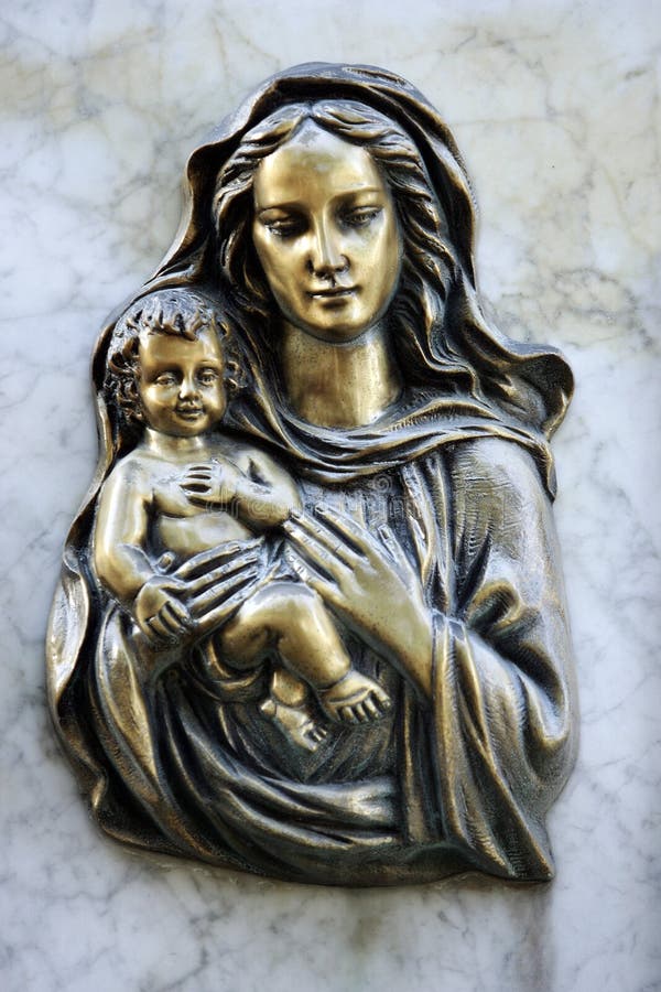 Decoration on marble tomb ,Virgin Mary and little Jesus. Decoration on marble tomb ,Virgin Mary and little Jesus