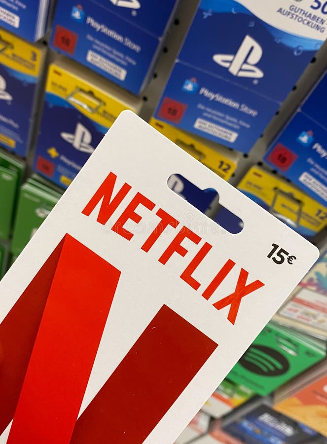 View on Netflix gift voucher card hold by hand in german supermarket