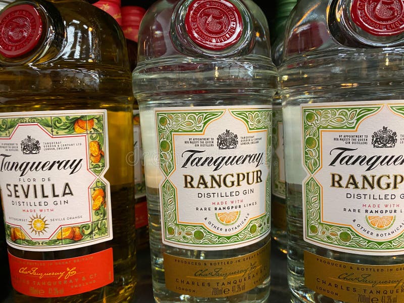 Close up of Tanqueray rangpur gin bottles in shelf of german supermarket